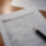 Detailed tax return forms laid out on a desk