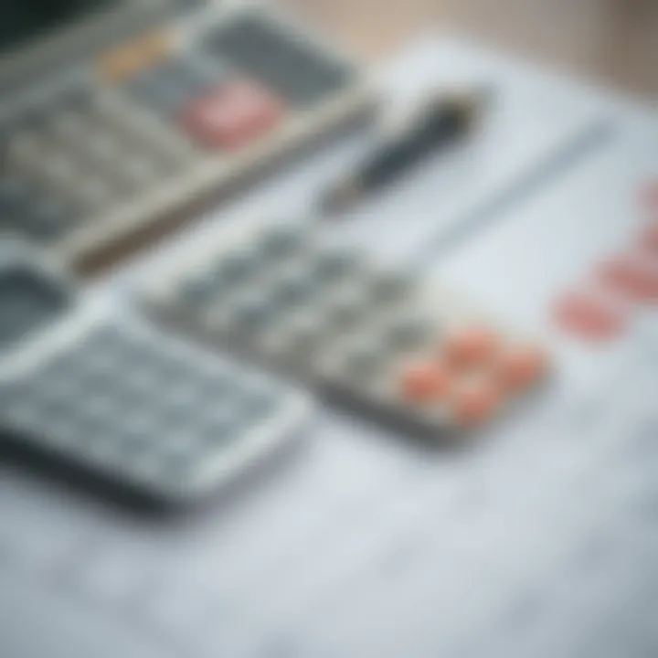 A close-up of a calculator and financial documents